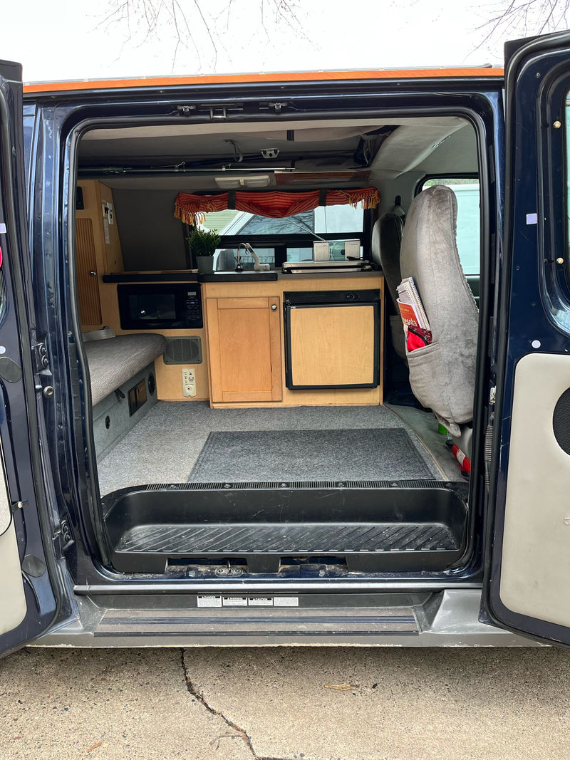  perfect for your next adventure.|Cozy night setup: an RV rental campervan with a lighted awning — photo 5