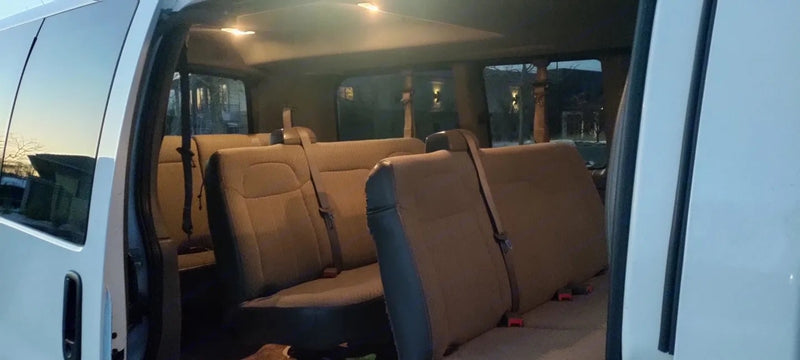  ideal for group trips or as a support vehicle for rv rental adventures.|White passenger van — photo 5