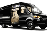 Black luxury Mercedes-Benz Sprinter van RV rental, side door open to reveal cream leather seats & lighted interior.