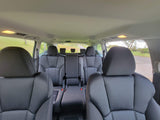 Rear car seats & ceiling inside vehicle. Great for road trips; consider instead of an rv rental.