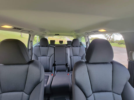 Rear car seats & ceiling inside vehicle. Great for road trips; consider instead of an rv rental.