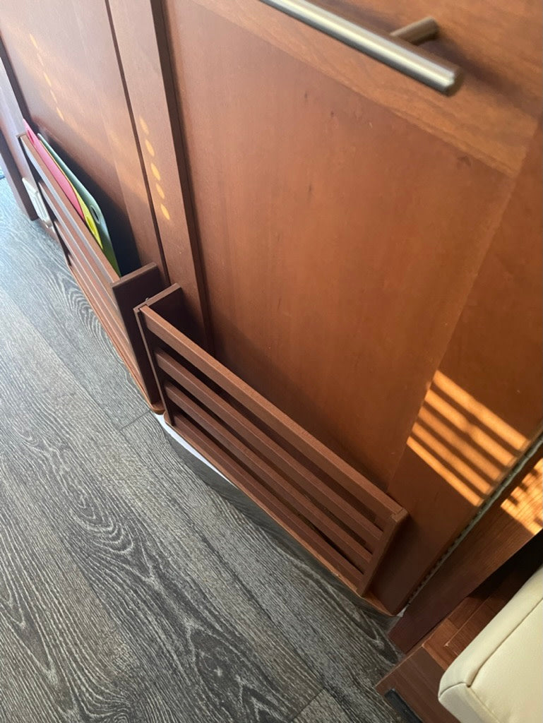  and sleek dark countertop.|Inside an RV rental: overhead wood cabinets with frosted glass doors — photo 11
