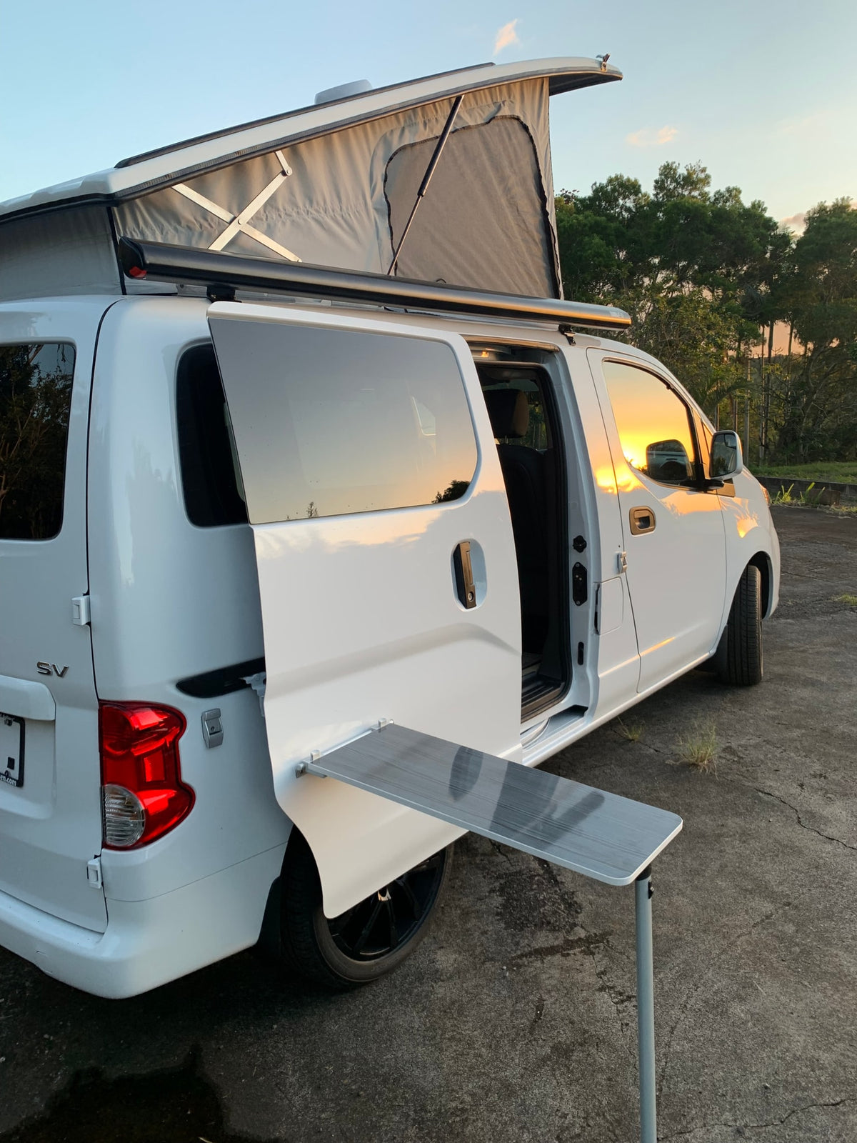  and outdoor shower hookup.|Inside an rv rental camper van — photo 15