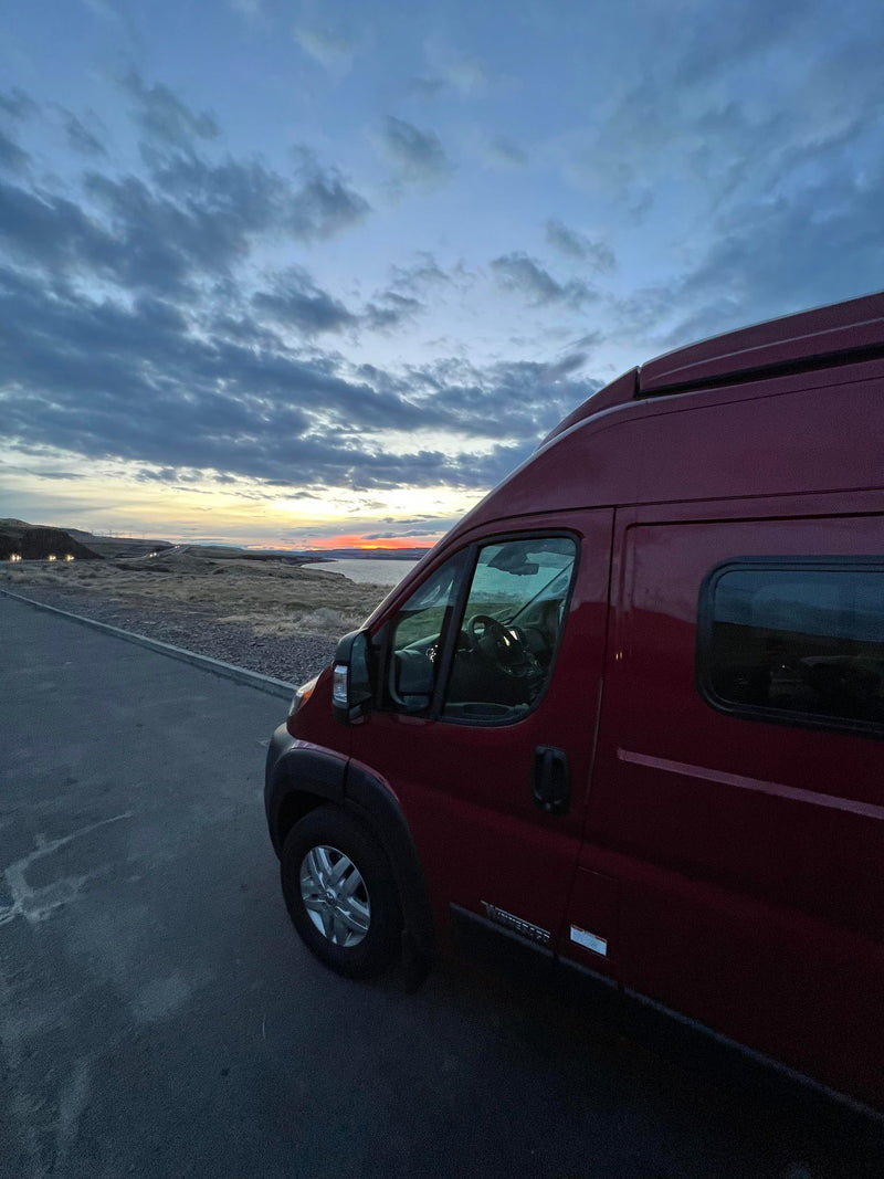  a driver navigates a scenic road with wind turbines — photo 8
