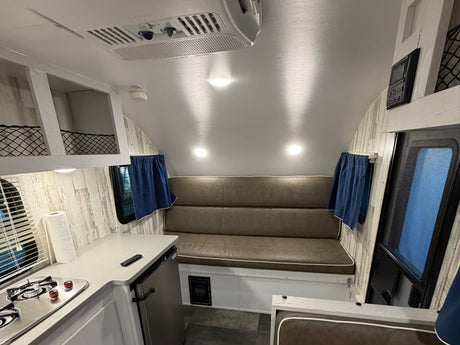 Inside a cozy rv rental: kitchen with stove