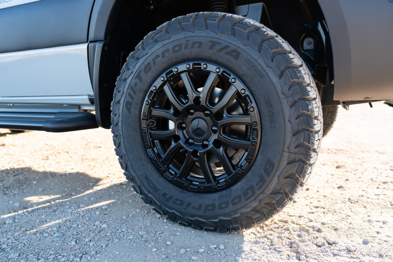 Close-up of a BFGoodrich all-terrain tire and black Mercedes-Benz wheel on an RV rental, ready for adventure. — photo 7