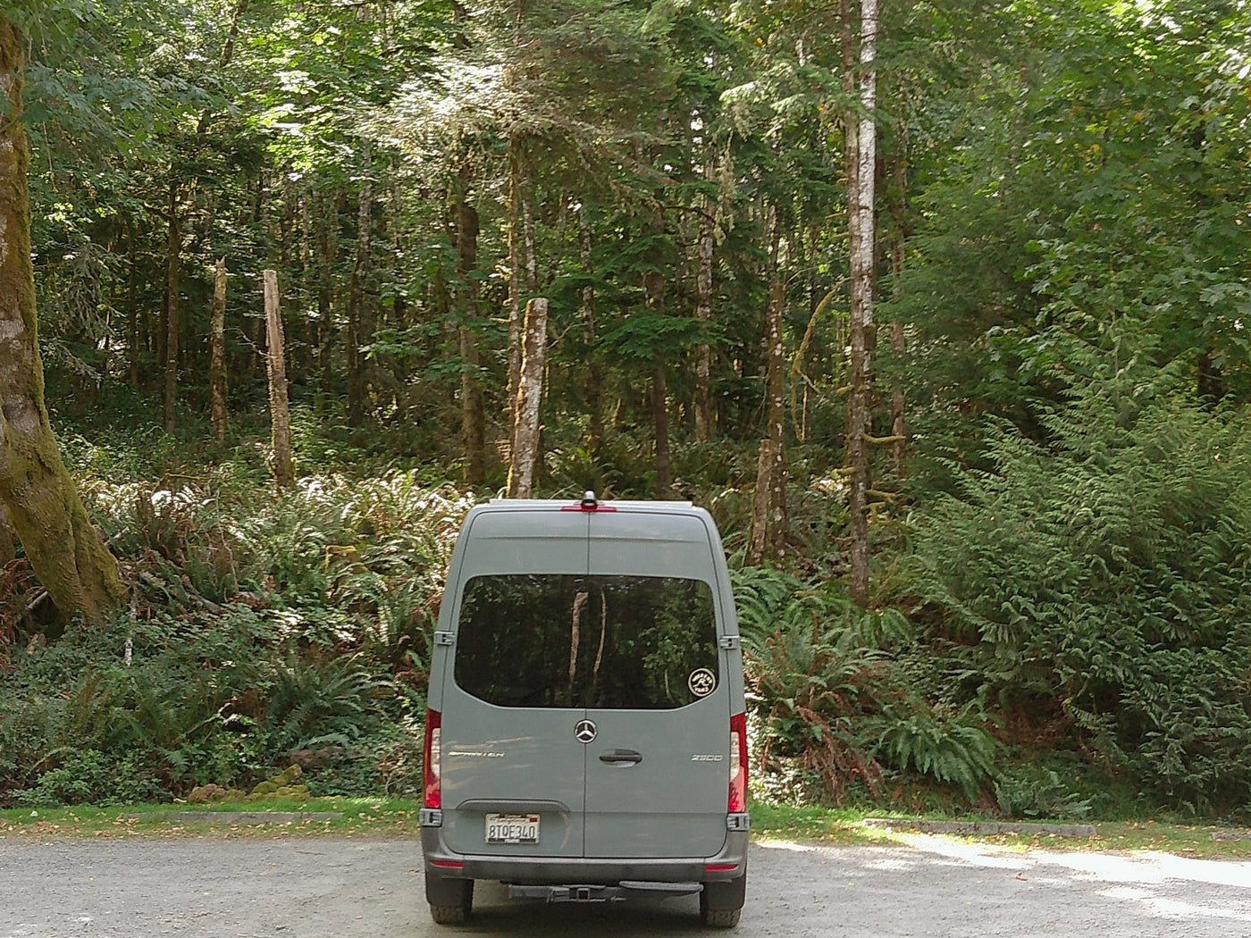  and comfy front seats.|A light gray camper van — photo 9