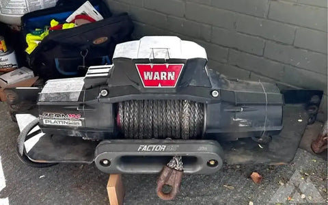 Warn winch 12,000 lbs will trade for dirtbike