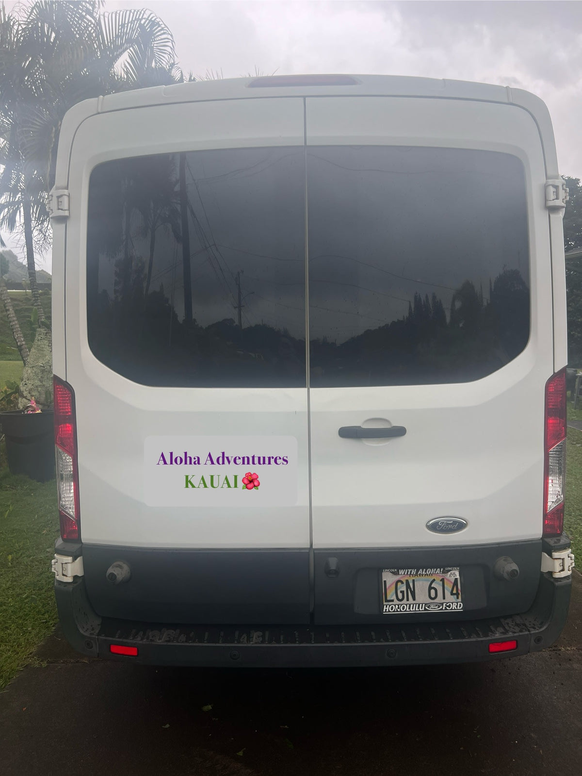  and hazard light button.|RV rental climate control panel. Left knob controls blower speed (0-4); right knob for air direction and temperature.|Spacious RV rental interior featuring gray passenger seats — photo 16