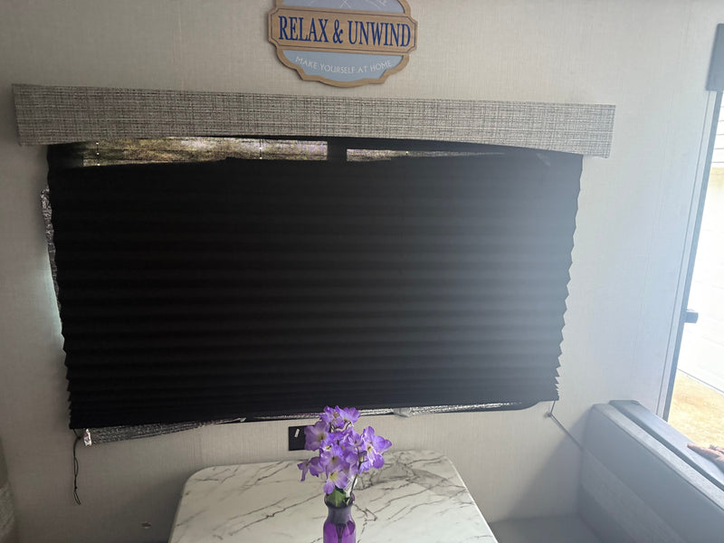  and windows on both sides.|Cozy RV rental dinette with window view — photo 6