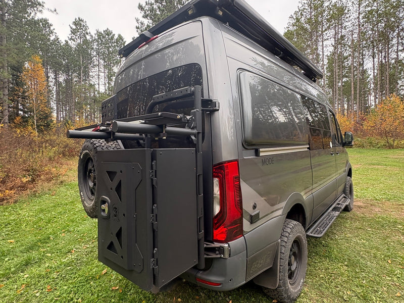  ready for adventure with off-road gear.|Black camper van RV rental — photo 14