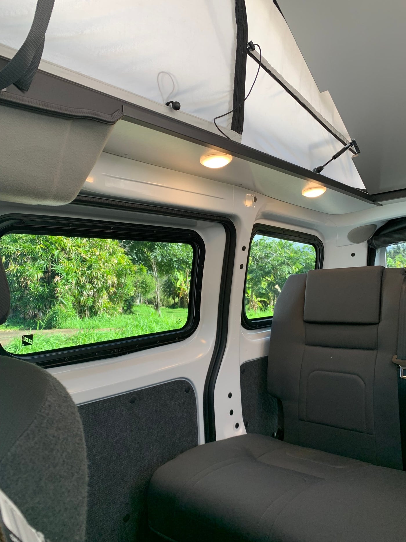  & digital controls for comfortable mobile living.|Two pop-top camper vans — photo 10