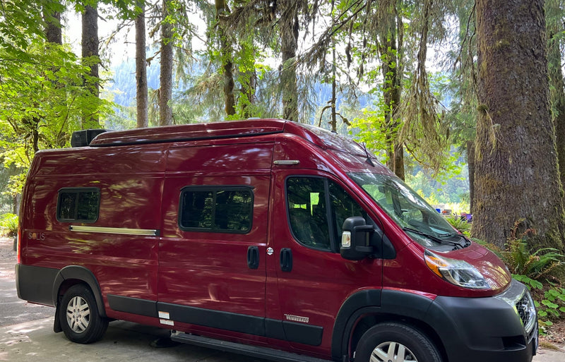  ready for adventure! This rv rental is parked in a lush — photo 3