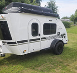 White Luna Rover teardrop camper, a perfect RV rental for memorable camping and travel.