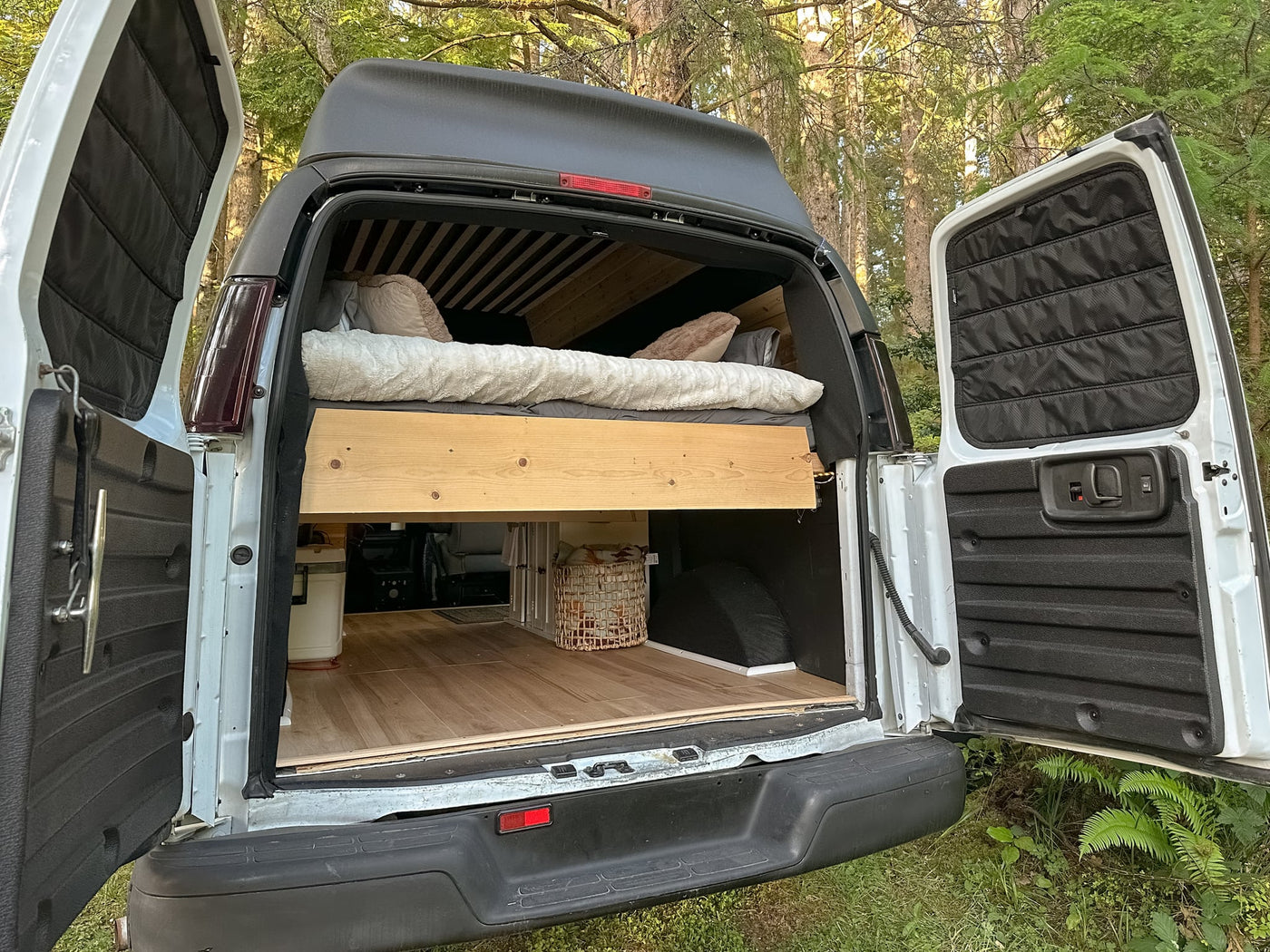  and a plate for compact kitchen essentials.|RV rental glamping: Starlight Theatre setup with popcorn maker — photo 15