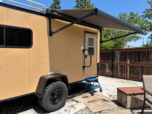 Tan converted cargo trailer