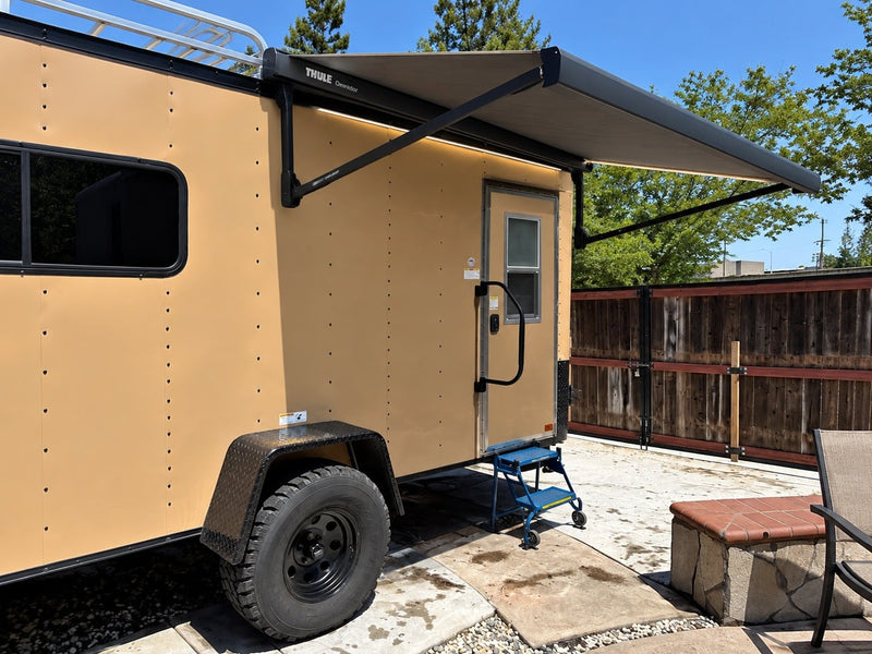 Tan converted cargo trailer — photo 1