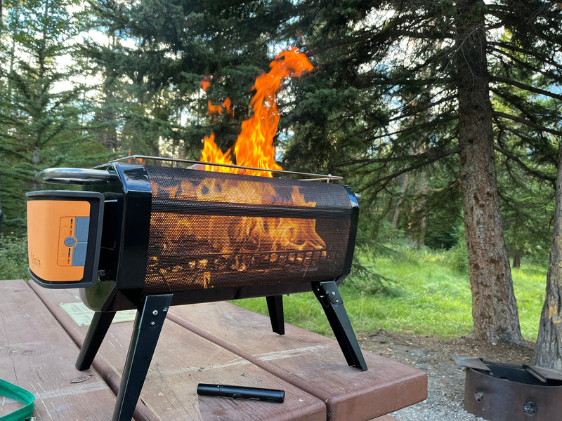 Bright flames from a BioLite portable fire pit at an RV rental campsite. Outdoor warmth & ambiance. — photo 10