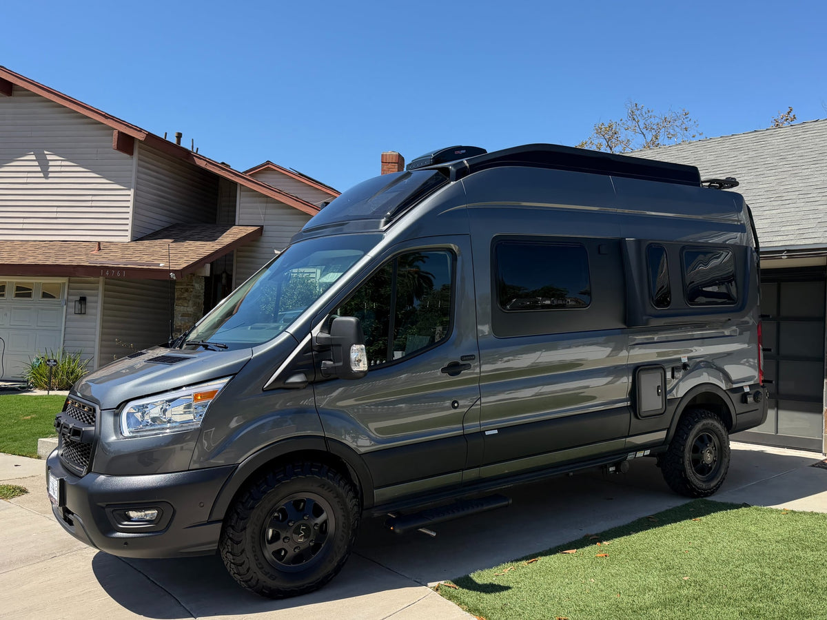 This gray Ford Transit camper van rv rental — photo 1