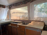 Family popup camper trailer