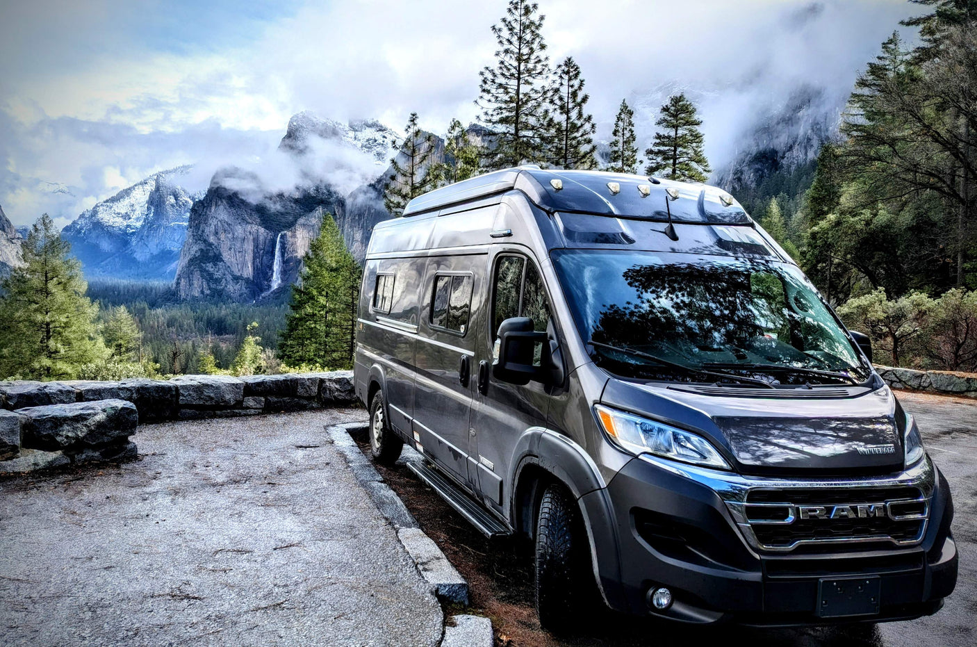 Experience Yosemite National Park's majestic mountains & waterfall from your rv rental camper van. Perfect view!