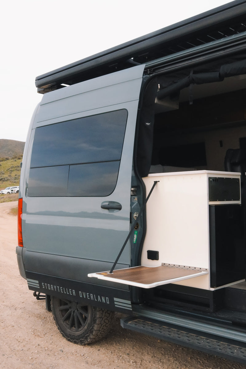  revealing interior features for adventure.|Storyteller Overland RV rental with an open side door — photo 2