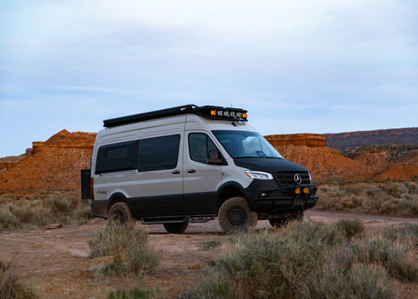 Rugged Mercedes Sprinter camper van, ideal for your next RV rental desert adventure, showcasing off-grid capabilities.