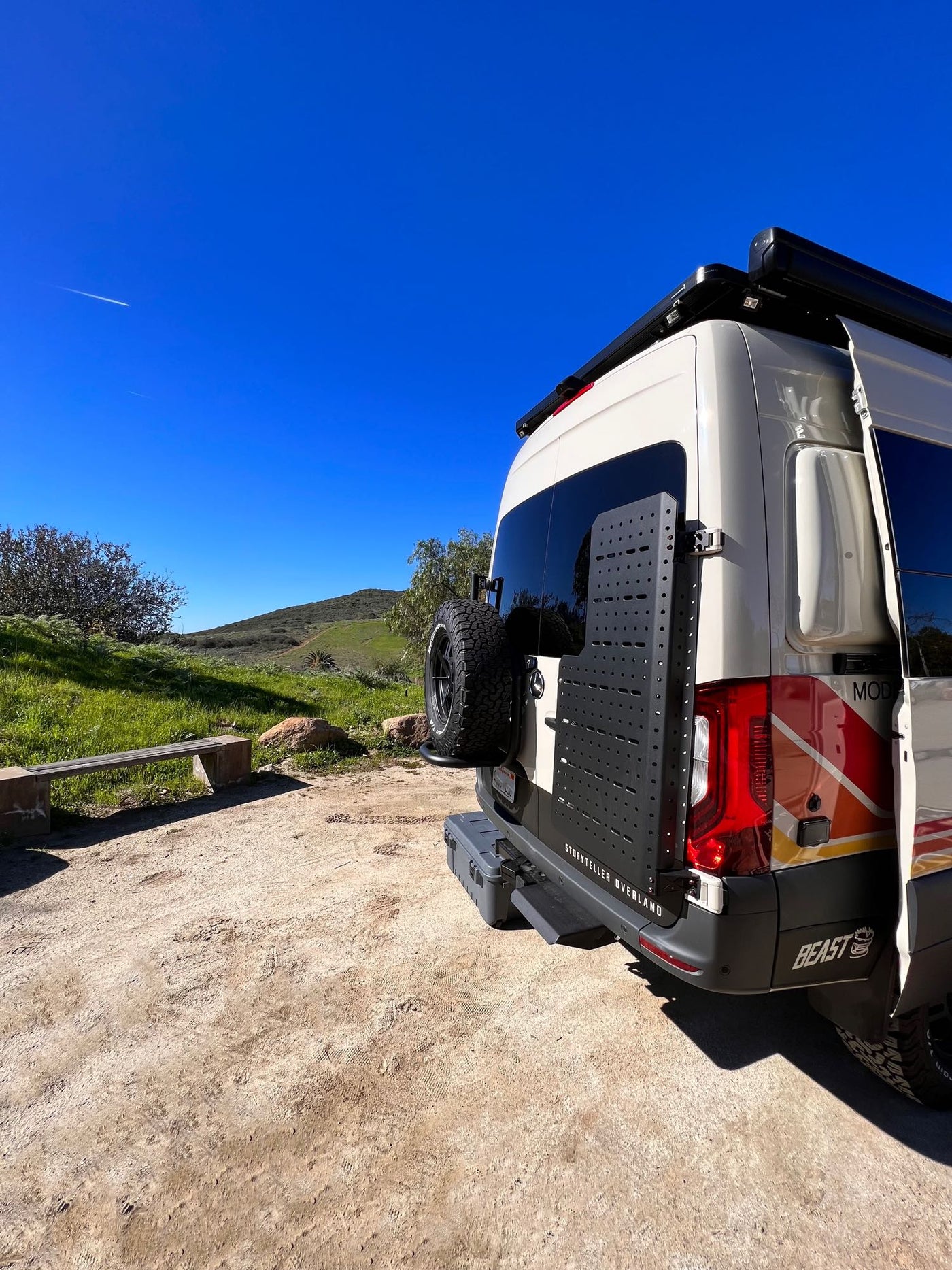  is ideal for your next RV rental adventure in the serene forest.|RV rental: full interior view from cockpit to cozy rear bed. Features include swivel seats — photo 8