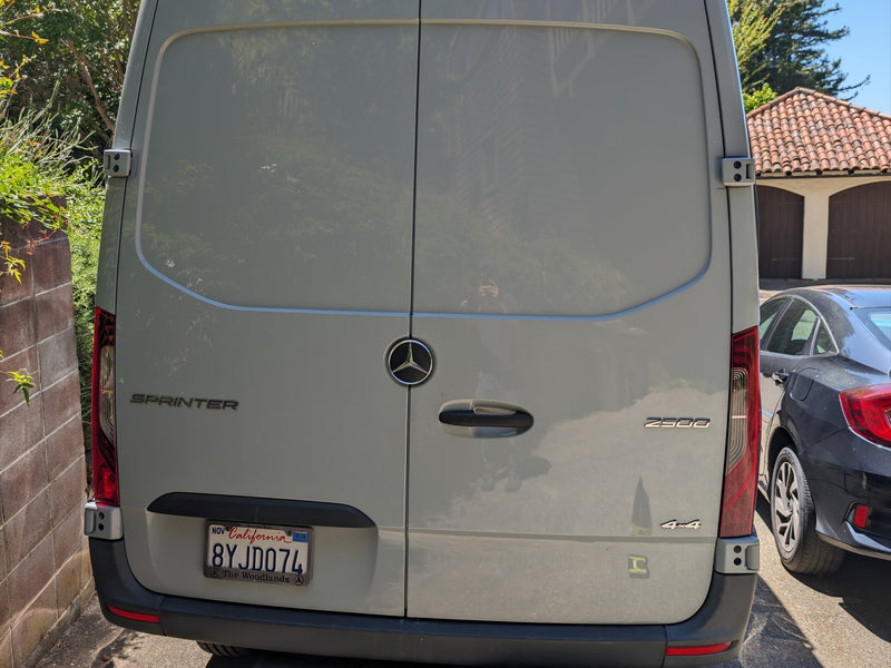  ideal for your next rv rental journey.|Rear of a white Mercedes-Benz Sprinter 2500 4x4 van — photo 4