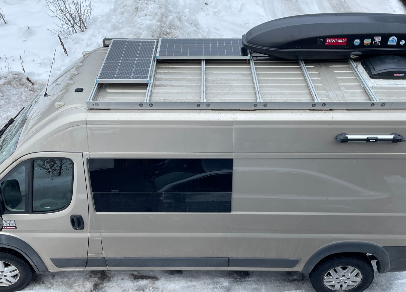  a cozy camper van conversion with a bed — photo 10