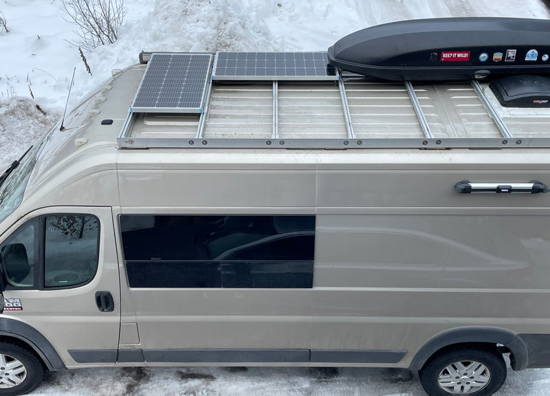  a cozy camper van conversion with a bed — photo 10