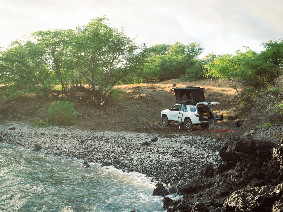  perfect for car camping adventures.|Ready Rigs RV rental: White Toyota 4Runner adventure vehicle with a rooftop tent — photo 4