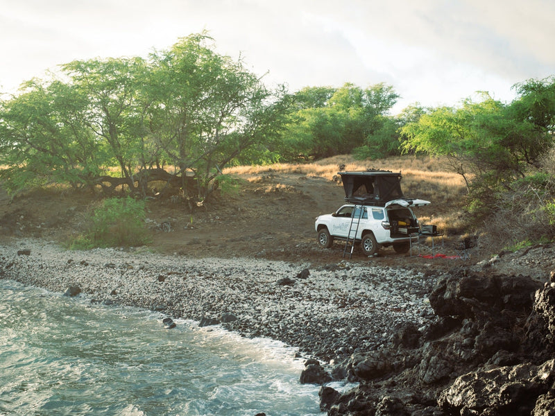  perfect for car camping adventures.|Ready Rigs RV rental: White Toyota 4Runner adventure vehicle with a rooftop tent — photo 4