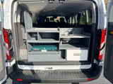 RV rental camper van interior: Custom kitchenette with sink, propane stove, and Dometic fridge in a white van conversion.