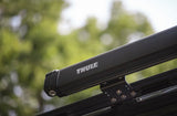 Black Thule awning case with logo, ready for your RV rental. Enhances camping & outdoor comfort.