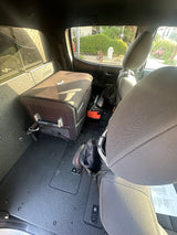 RV rental interior: Dometic fridge & Jackery power station secured in a custom cargo system. Ready for travel.
