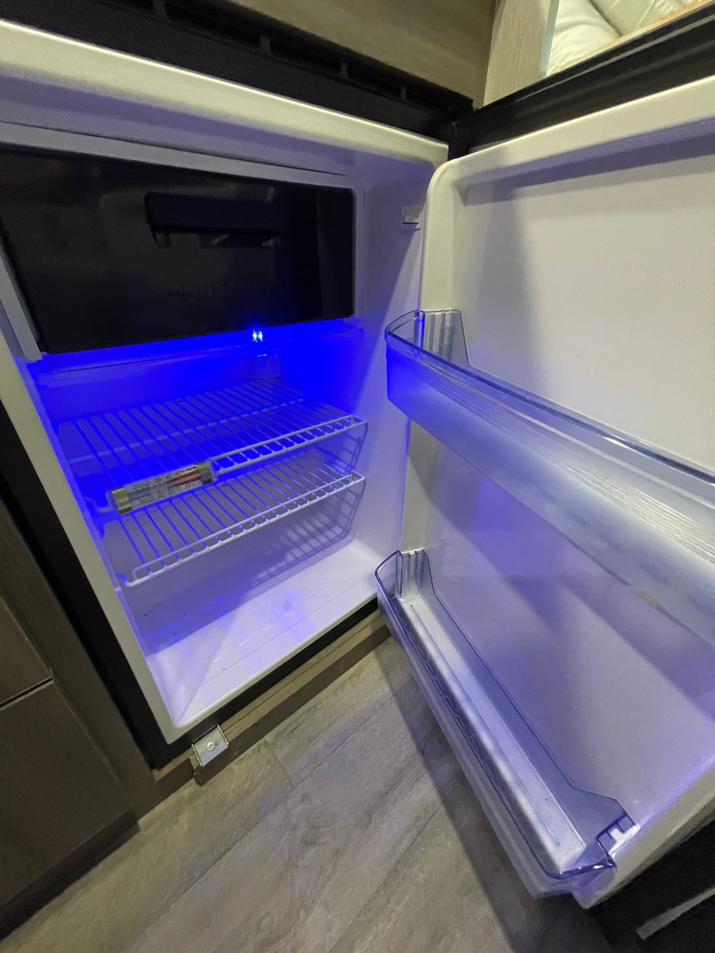  featuring a compact kitchen on the left — photo 7