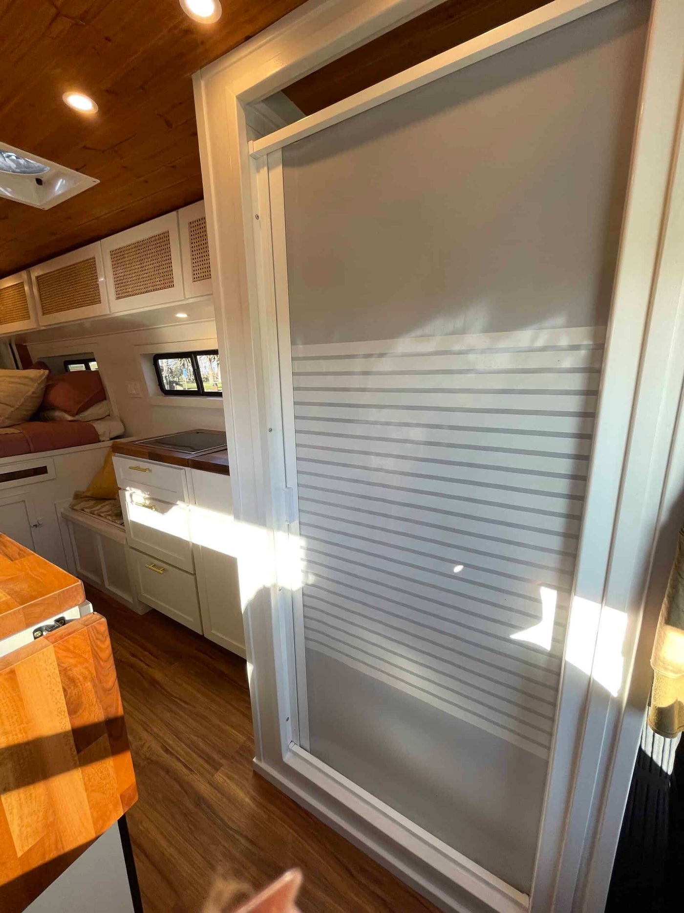  ready for a road trip.|This RV rental showcases a stylish interior with a tiled shower — photo 9