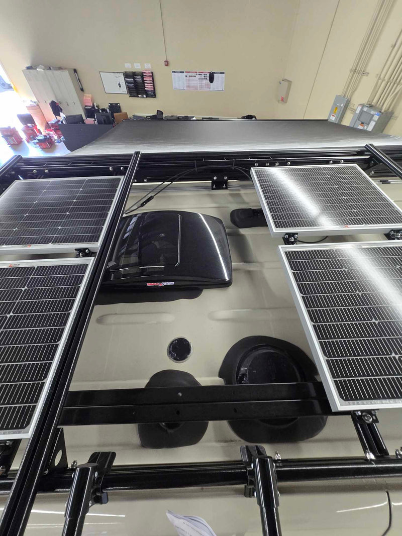  and overhead storage bin.|RV rental interior showcasing a compact kitchen — photo 17