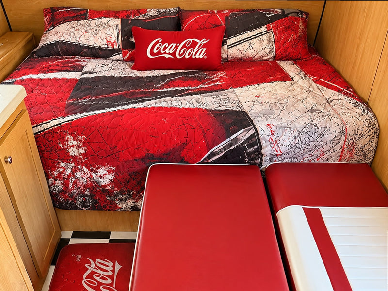  and checkerboard floor.|Experience a fun RV rental! This camper bedroom features bold red — photo 5