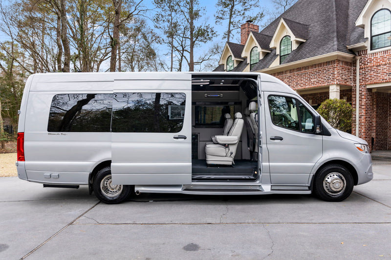  featuring wood flooring and ambient lighting.|Experience comfort in this rv rental. Driver's view of the sleek Mercedes-Benz dashboard — photo 16
