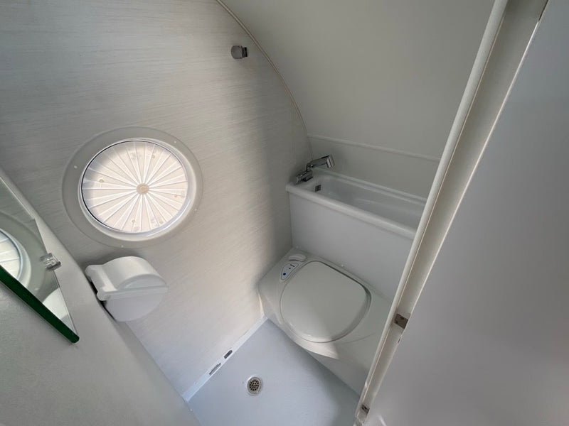  revealing its practical layout with integrated bathroom — photo 10