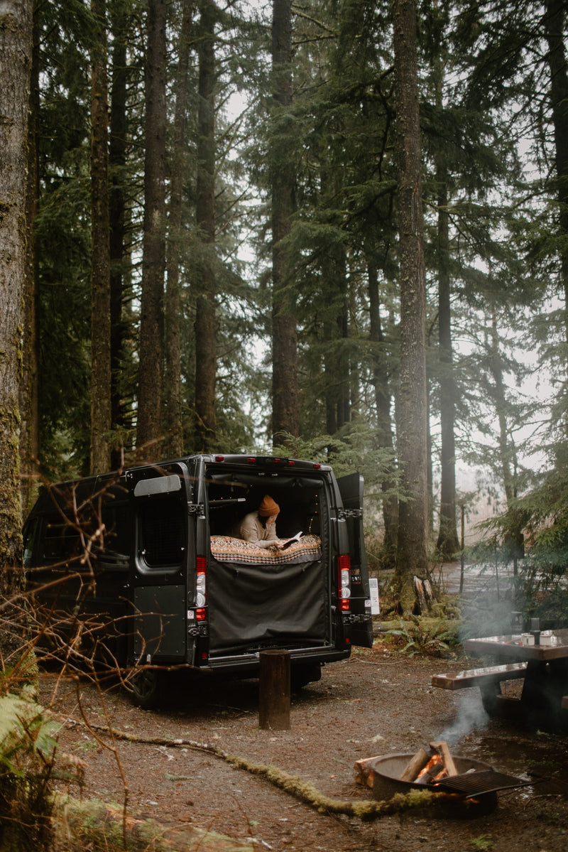  ready for outdoor adventure.|Forest retreat: Man sips coffee in a comfortable rv rental camper van — photo 37