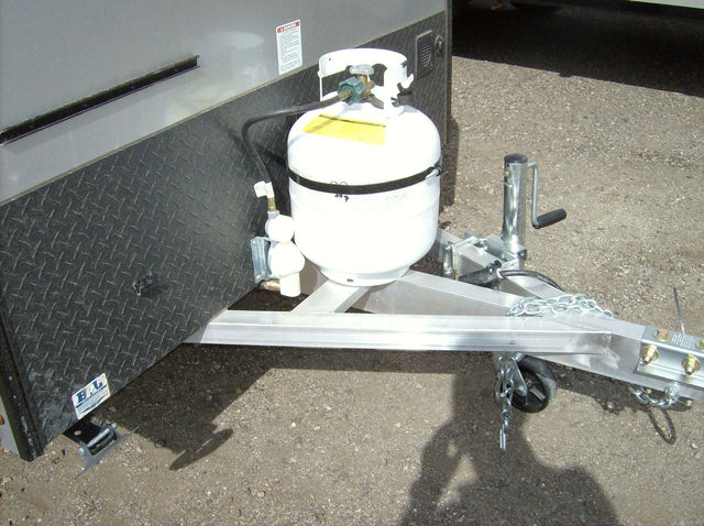  a compact travel trailer with roof rack