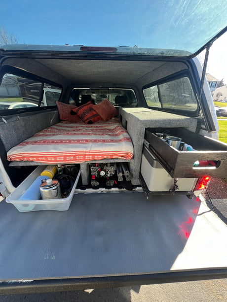 A cozy truck bed camper for adventure
