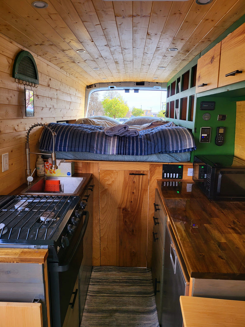 Fully equipped camper van interior — photo 1