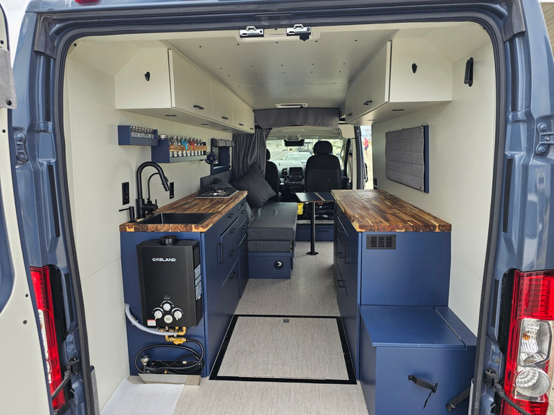  and adaptable sleeping areas.|Inside an rv rental parked at the beach — photo 4