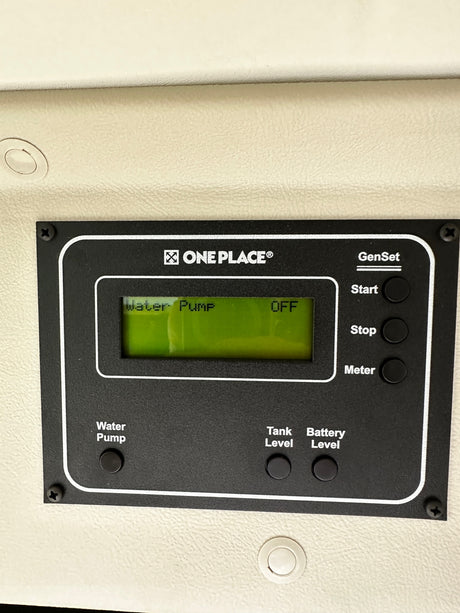 RV rental control panel: GenSet, Water Pump (OFF), Tank & Battery Level indicators. Essential for travel comfort.