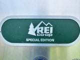 REI Co-op Special Edition emblem on a metallic surface, likely for an RV rental. Ready for your next outdoor adventure.