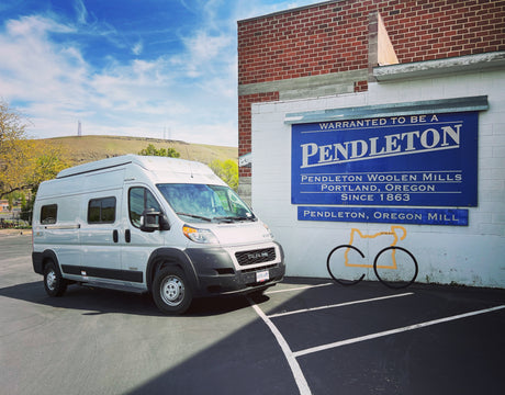 This RV rental (camper van) is parked at the historic Pendleton Woolen Mills in Oregon, perfect for a road trip.